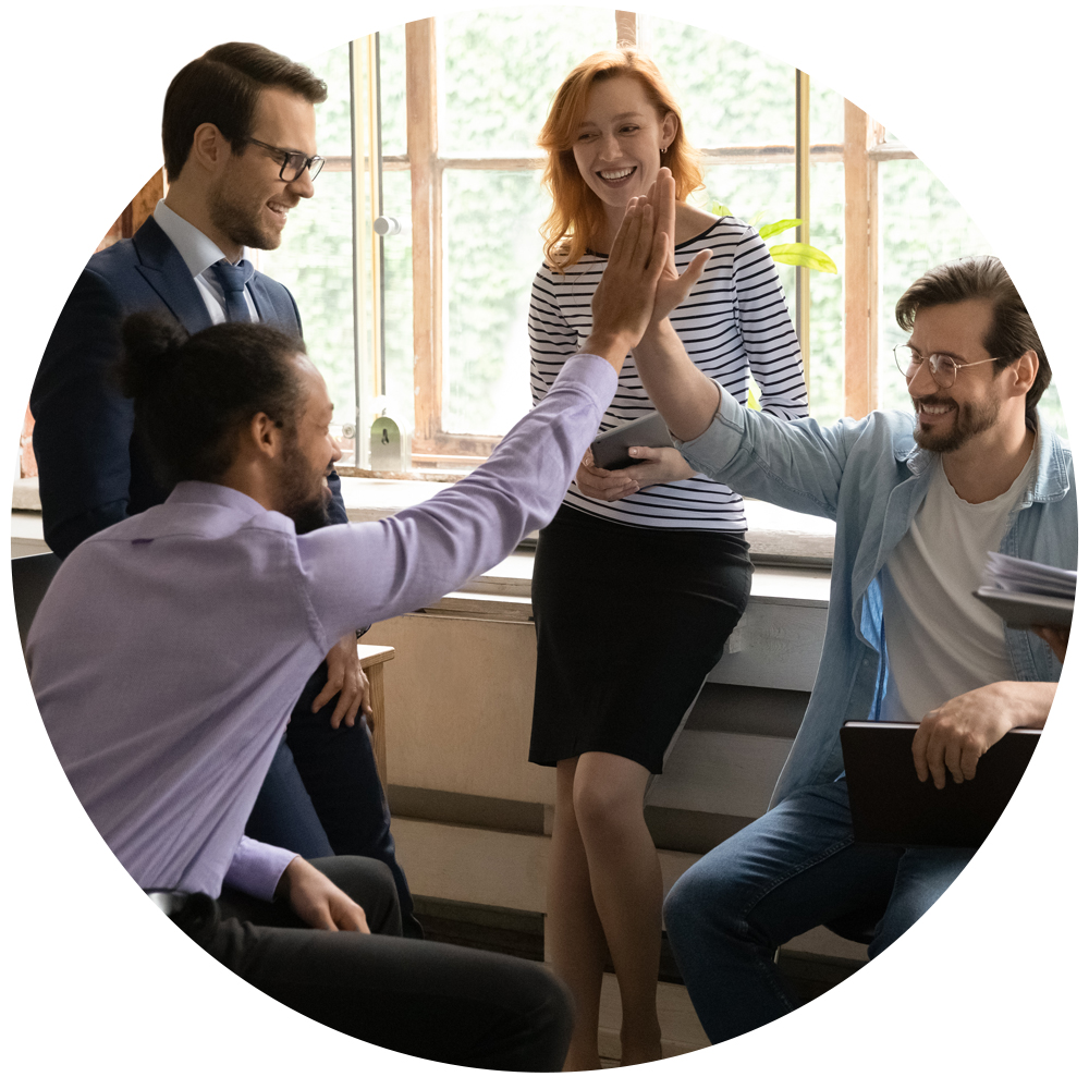 Circular image of a happy and engaged workforce