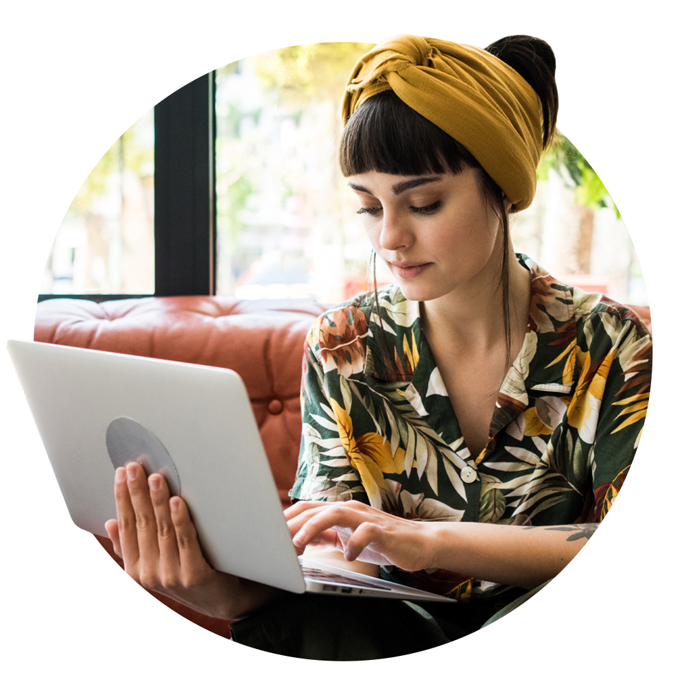 Circular image of an office worker writing a remote working policy