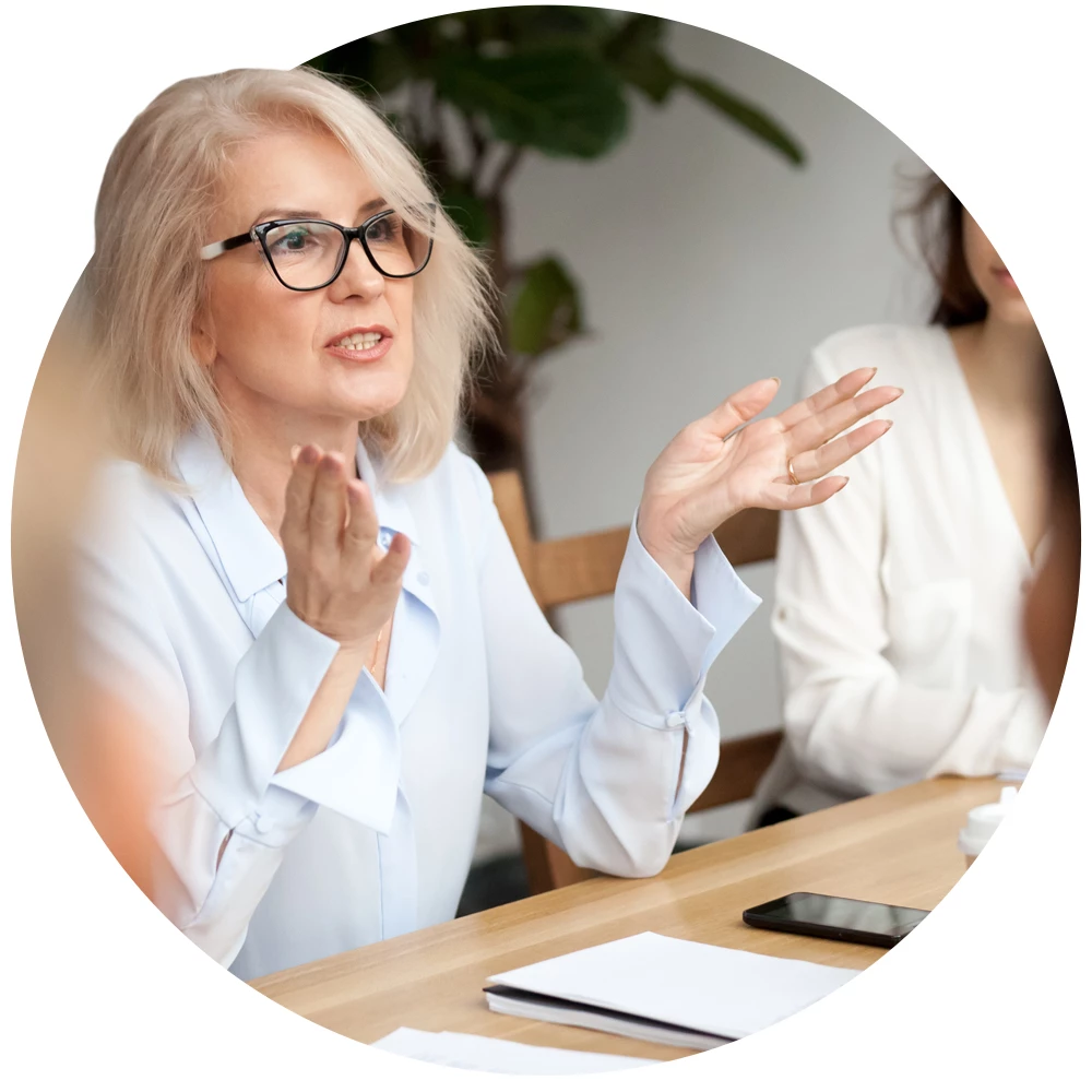 Circular image of female worker advocating for menopause in the workplace