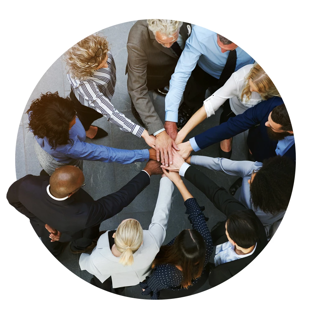 Circular image of a team demonstrating inclusivity