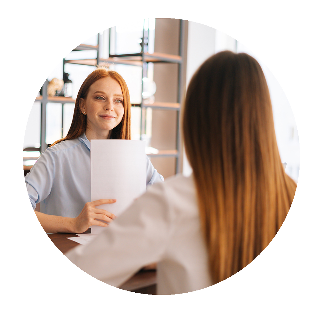 Circular image of new candidate being interviewed