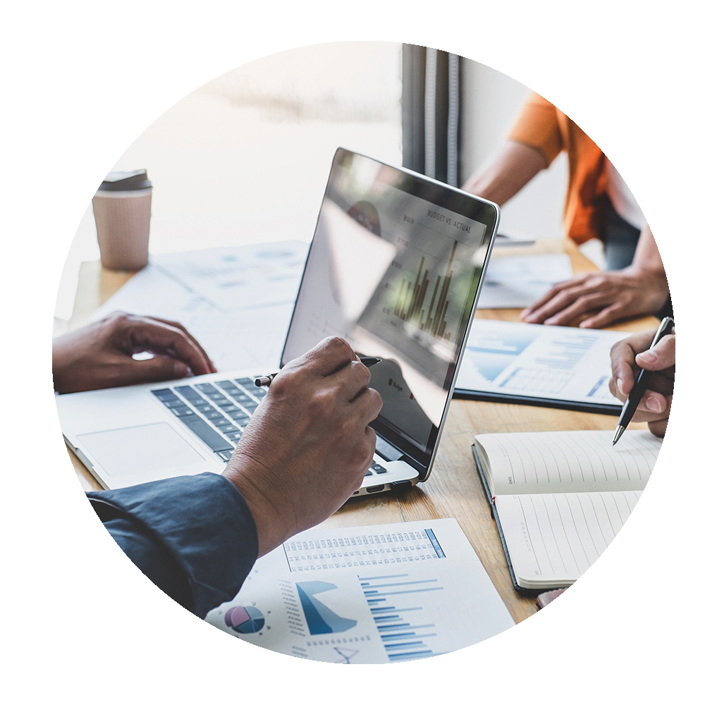 Circular image of office workers discussing in a meeting