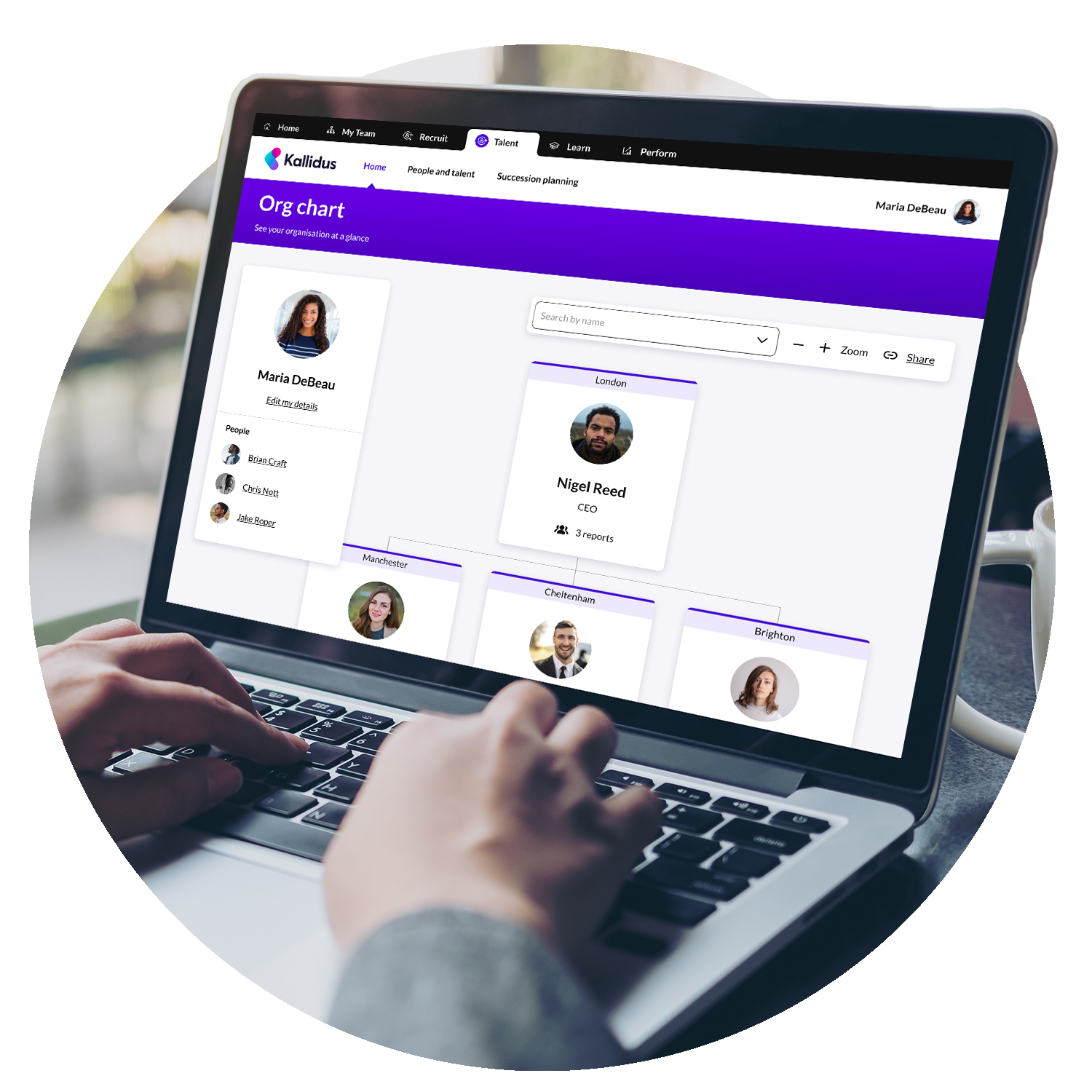 Laptop showing an org chart in our talent management system