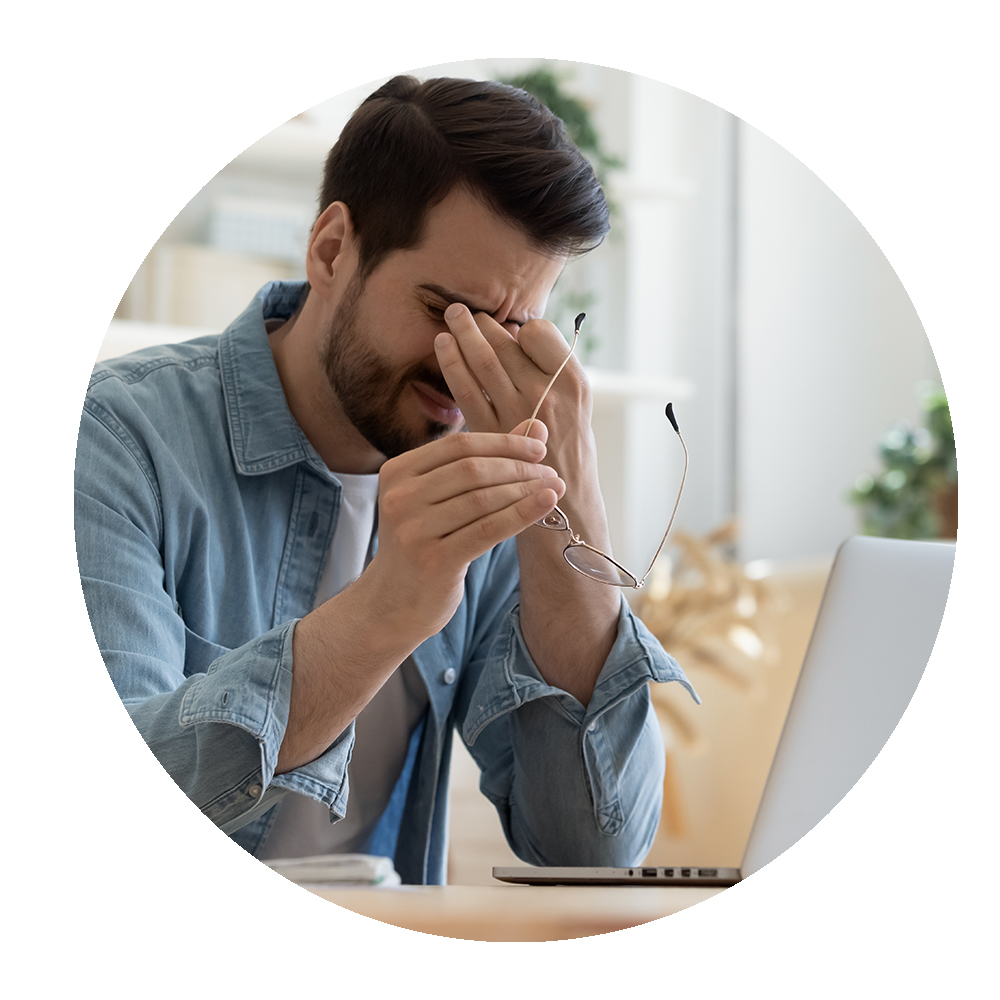 Circular image of a tired employee that is burned out