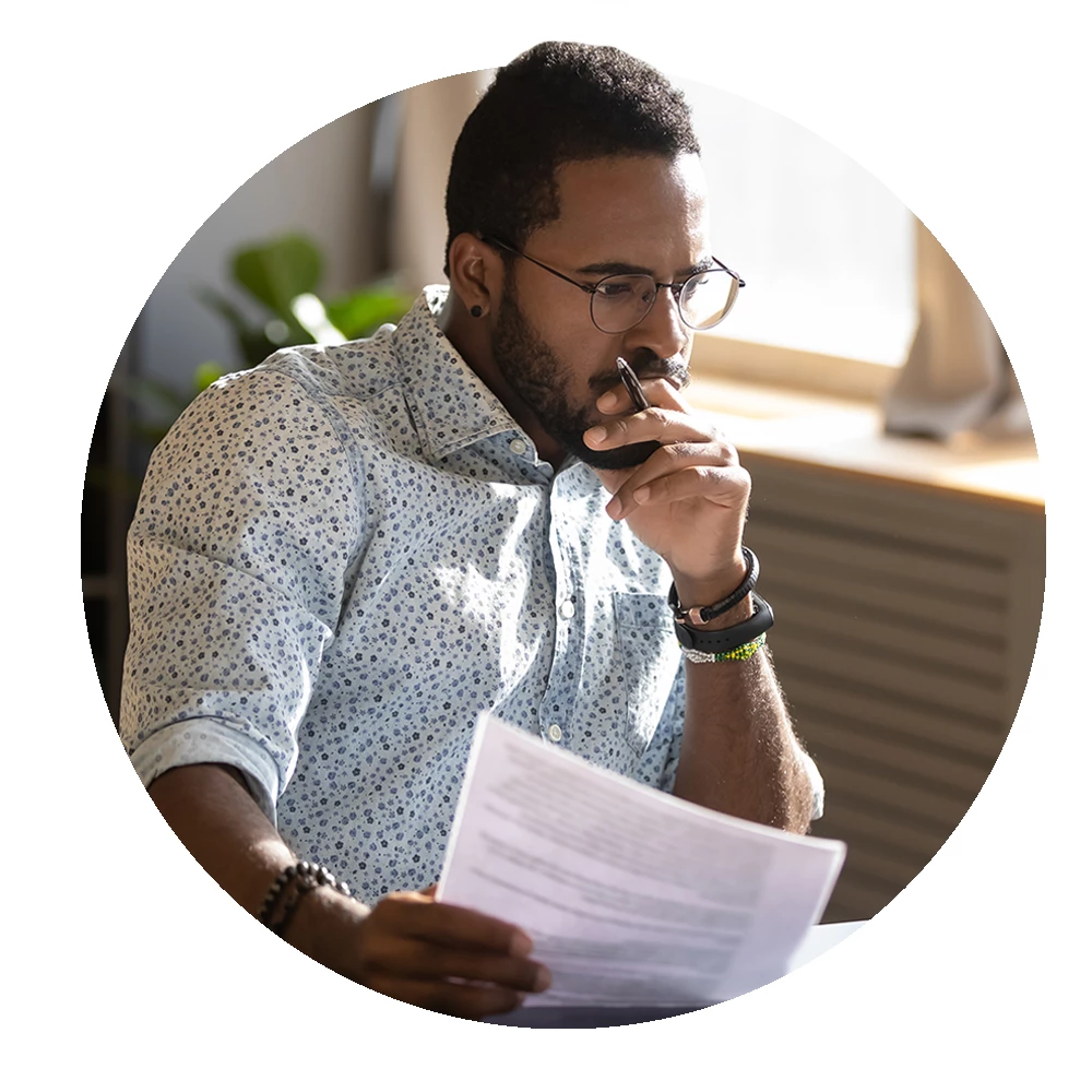 Circular image of office worker figuring out compliance