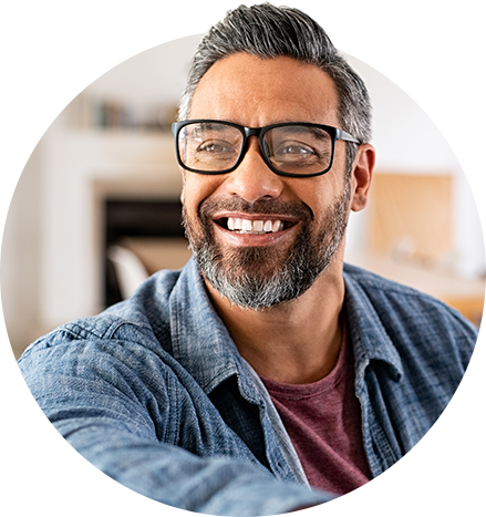 Man smiling after discussing his mental health in the workplace - circular image