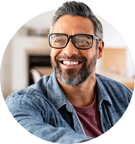 Man smiling after discussing his mental health in the workplace - circular image