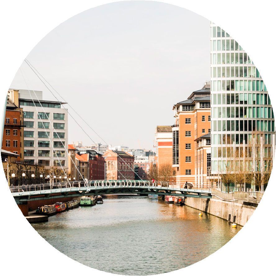 Circular image showing the Castle Bridge and other commercial buildings in the city of Bristol