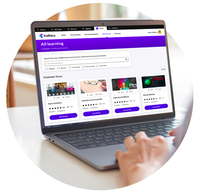award-winning Office worker scrolling through Learn LMS at the courses they need to complete