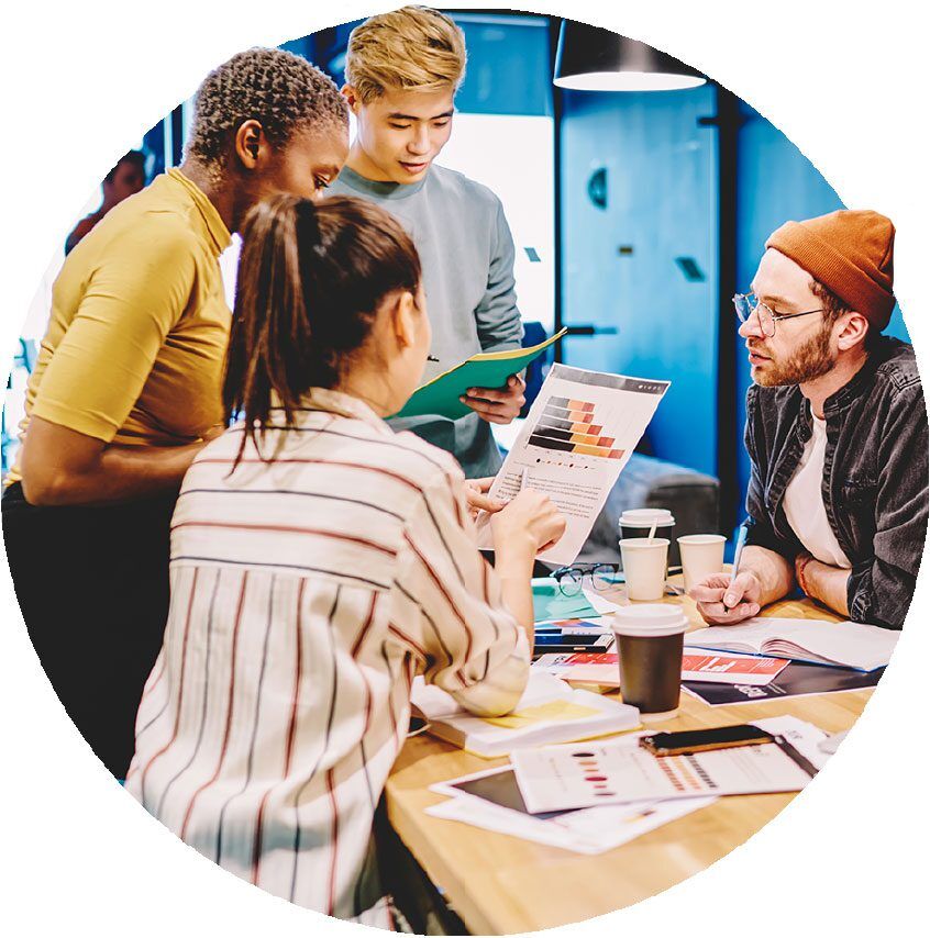 Young team members talking in a meeting