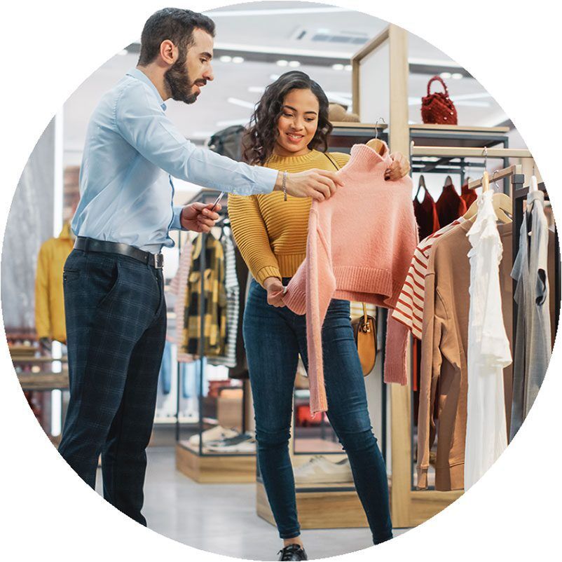 right-people Retail worker helping a customer whilst looking at a product